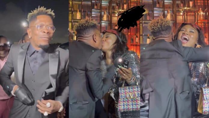 Shatta Wale and Abena Korkor were caught kissing while listening to Medikal's Planing and Plotting  (VIDEO).